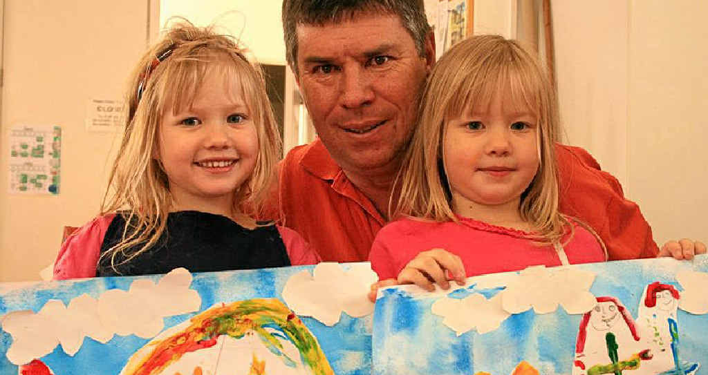 Charlotte and Addison with their dad Andrew McIntosh and their collage paintings. Charlotte and Addison with their dad Andrew McIntosh and their collage paintings.